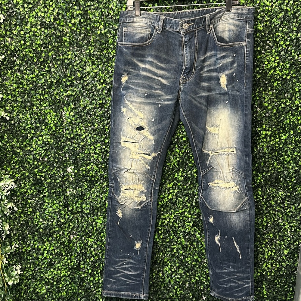 Acid washed ripped jeans